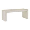 Oblique angle highlighting bench edges and terrazzo texture in natural light with artistic wall