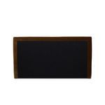 Back of Quincy Bed showing clean lines with black fabric backing and Surrey Ochre velvet frame border
