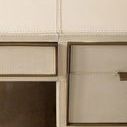 Top-down close-up view of two adjacent drawer fronts on Hunter Desk showing stitching and brass edge