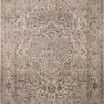 Traditional Lyra Natural Gold rug with watercolor-inspired muted gold, beige, and gray tones and an intricate central meda...