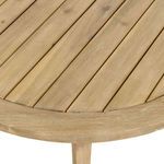 Close-up of slatted wood grain and smooth finish on the coffee table surface