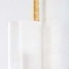 Close-up of top textured gold leaf rod extending above frosted cloud glass shade