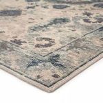 Close-up angled view showing detailed wool texture and edge binding of rug corner