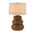 Mabrouka Table Lamp with lit beige drum shade casting warm glow