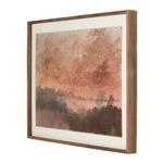 Painting angled to show depth and thickness of wooden frame with white matting