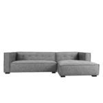 Front-facing view showing the full seating surface and uniform tufting on back cushions