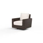 Montecito Swivel Rocker Club Chair with rich Cognac multi-colored resin wicker and cream cushions