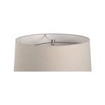 Close-up top view of the rolled-edge linen empire shade’s interior metal frame and finial
