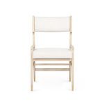 Front view highlighting square seat cushion and wide backrest on bleached oak frame.