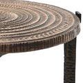 Close-up angled view focusing on the detailed textured edge and leg connector of the table