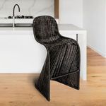 Bar stool placed in modern kitchen with wooden floors and white island countertop