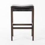 Aya Stool back view on white background showing squared wood framing and leather seat edge