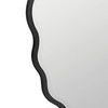 Lower right corner detail showing rounded scallop and edge thickness
