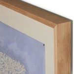 close-up on the top corner highlighting the thickness and grain of the natural wood frame