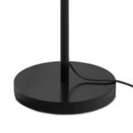 Side view of heavy round base with thick lamp pole and power cord exiting the base