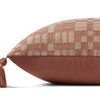 Side profile of Ellery clay pillow showing solid muted clay color back and tassel detail