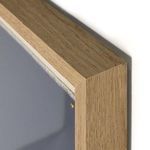 close-up of white oak frame grain and mitered corner holding the photographic print