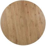 Top-down view showing the natural grain and subtle knots on the round driftwood table surface