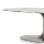 Extreme close-up of raw nickel finish showing grainy and pitted metal texture
