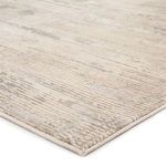 Close-up showing carved-like texture and linear pattern on Paxton Abstract Gray/Ivory rug