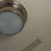 Siena Small Flush Mount mounted on ceiling next to an air vent, seen from a side angle