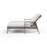 Side profile of Laguna Double Chaise revealing slim armrest and angled reclining back cushions