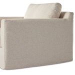 Rear side angle showing fabric texture and soft edge profile of chair back and armrest