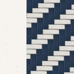 Close-up of navy and white woven pattern sample resembling the chair’s seat and back weave