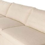 Close-up showing thick seat cushions and soft fabric texture on middle section