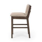 Side angle of Wilmington Stool showing thickness of back and seat cushions in beige fabric