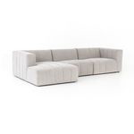 Alternate angle of full sectional set with ottoman, showing wide channels and rounded arms