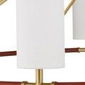 Close-up of linen fabric canister shade and tan leather wrapped brass ring with gold fittings