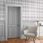 Heritage Plaid Wallpaper shown in room setting with gray door, beige armchair, and side table