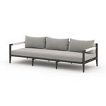 Three-quarter angle of Sherwood outdoor sofa displaying aluminum frame and rope accents
