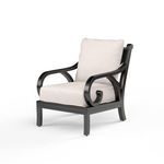 Monterey Club Chair with black aluminum frame, curled arm details, and beige cushions