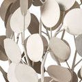 Close-up of overlapping silver disc petals and intertwined metal branches