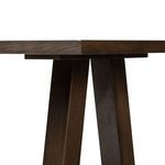 Underside view of Silverton Dining Table showing base joint connecting legs to tabletop