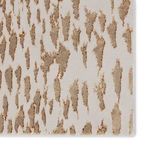 Close-up corner view highlighting the dense texture and color variation of ivory and gold leopard print