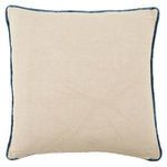 Back of pillow showing plain beige linen fabric with blue velvet piped edge