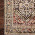 Detailed corner shot of Loren Multi Rug illustrating multi-color vintage pattern with faded reds and blues
