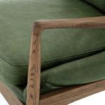 Rear view focusing on vertical seam and oak frame curve along backrest