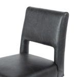Back view centered on cutout area beneath backrest and toasted nettlewood leg details
