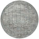 Round shape Anastasia Stone Blue Rug featuring the same ornate distressed pattern and muted color palette