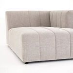 Top-down close view of channel stitching where seat meets right arm on sectional