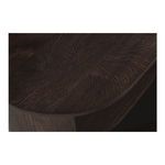 Close-up detail of Tommy nightstand's edge joinery and wood grain on top corner
