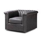 Three-quarter view of chair showing square arms and linear channel tufted backrest