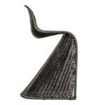 Side profile highlighting rattan weave structure and smooth curving seat back of stool