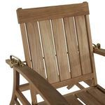 Close-up of teak slatted backrest and brass adjustment hardware on outdoor recliner