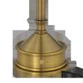Close-up of Traipse lamp base showing on/off button and matte brass finish detail