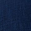 Close-up showing textured navy woven fabric of pillow cover